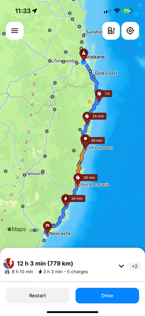 A screenshot of the A Better Route Planner app, with a route marked between Brisbane and Newcastle, with multiple pins indicating locations for electric vehicle charging.